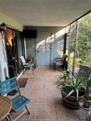 a building outdoor space with patio furniture