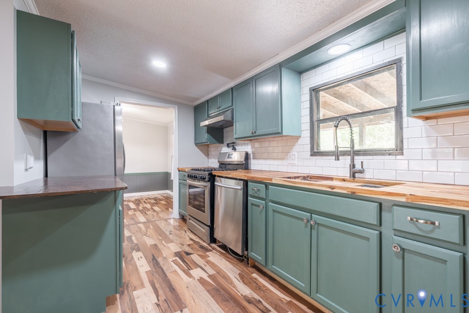 18017 Cox Road Sutherland, VA 23885 - Photo 11 of 49 Remodeled Kitchen with Bitcher Block countertops a