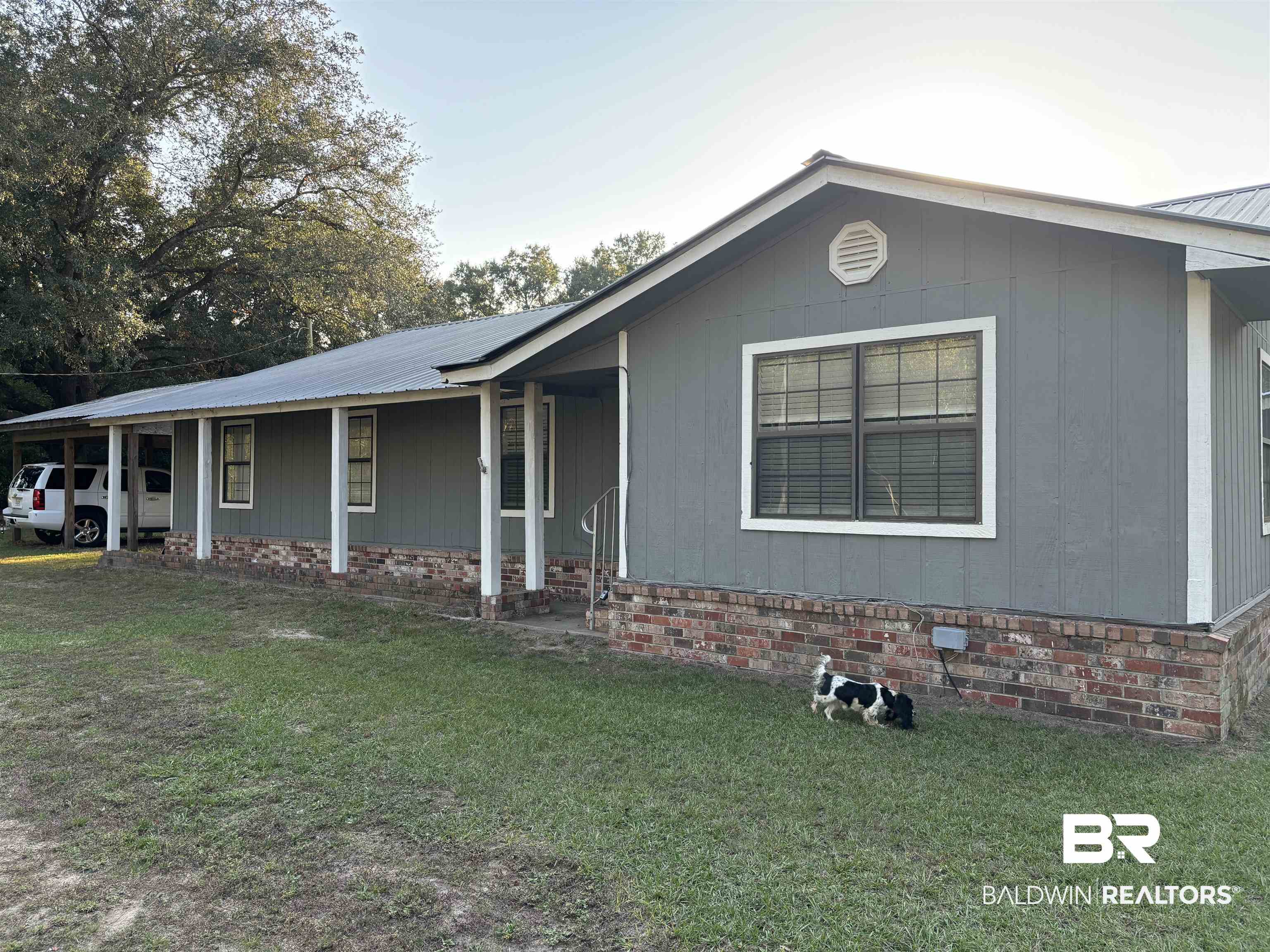 17495 County Road 48 Robertsdale, AL 36567 - Photo 6 of 37 Ranch-style home with a carport and a front lawn