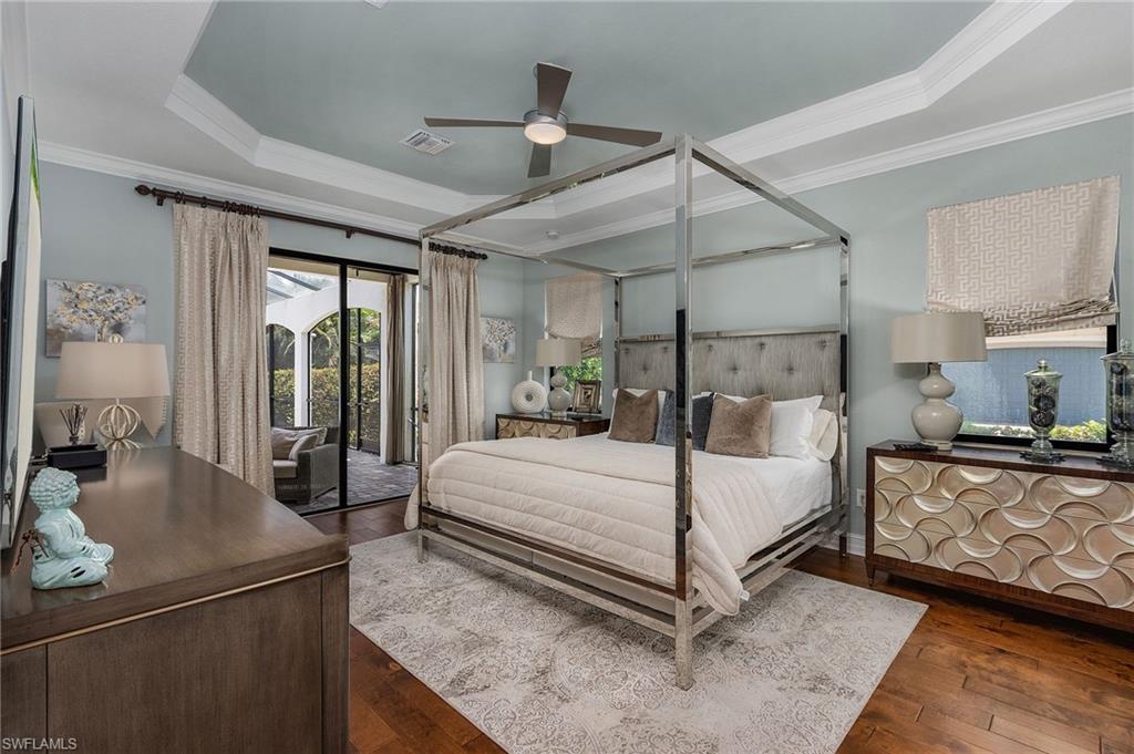 3423 Runaway Court Naples, FL 34114 - Photo 12 of 35 a bed room with a bed and a couch