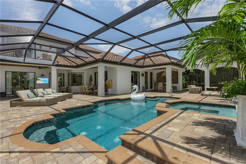 3423 Runaway Court Naples, FL 34114 - Photo 16 of 35 a view of a backyard with plants and patio