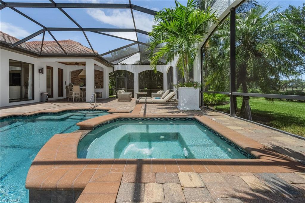 3423 Runaway Court Naples, FL 34114 - Photo 21 of 35 swimming pool view with a seating space