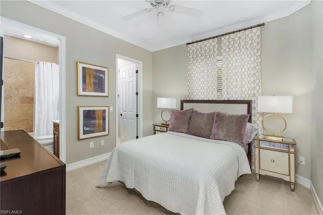 a bedroom with a bed and a table