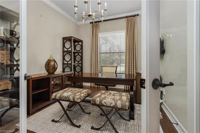 a view of a livingroom with furniture and windows