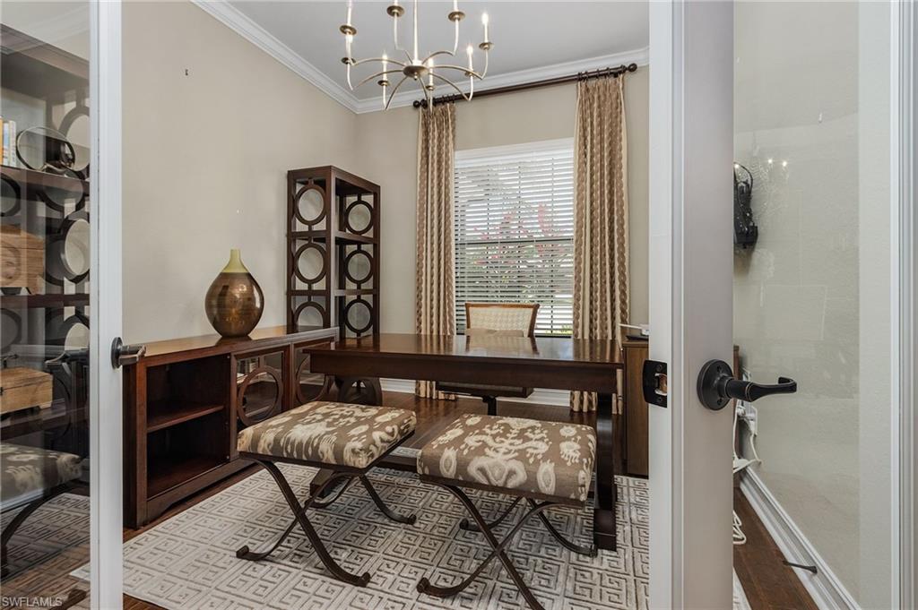 3423 Runaway Court Naples, FL 34114 - Photo 9 of 35 a view of a livingroom with furniture and windows