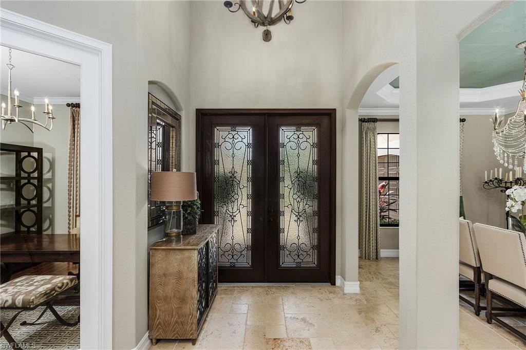 3423 Runaway Court Naples, FL 34114 - Photo 10 of 35 a view of entryway with livingroom and furniture