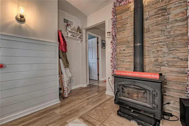 a view of a dining room with furniture and a window