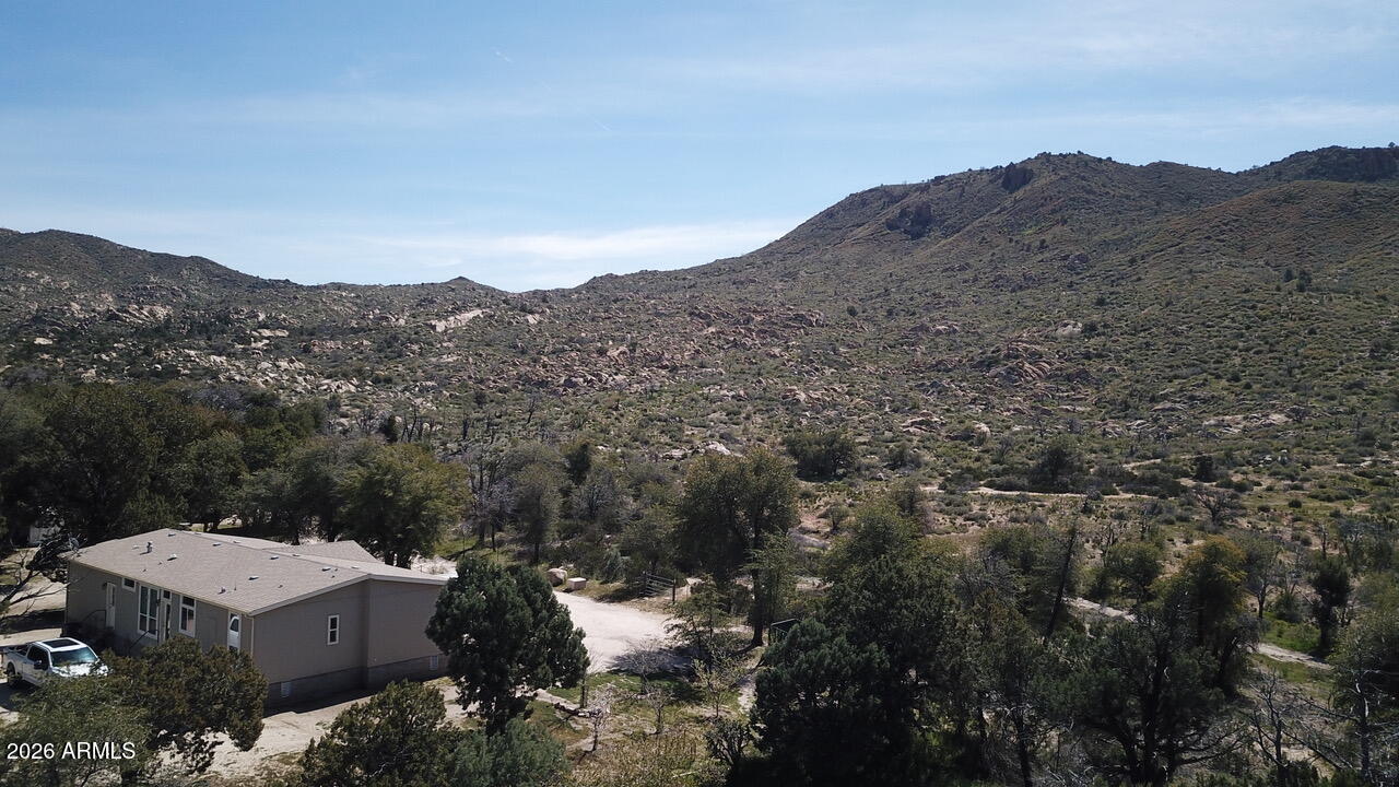 51092 North Pinal Ranch Road Miami, AZ 85539 - Photo 6 of 13 an aerial view of a house with mountain view