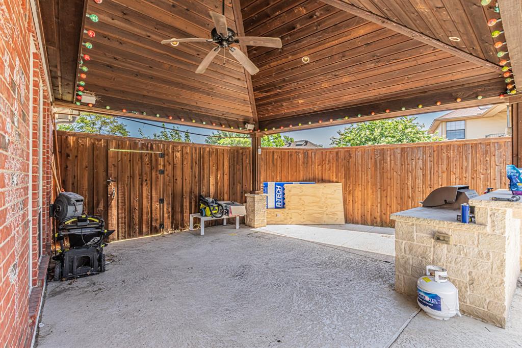 300 Sundance Circle Irving, TX 75063 - Photo 31 of 39 Covered patio featuring a wood-plank ceiling, ceiling fan, and recessed lighting