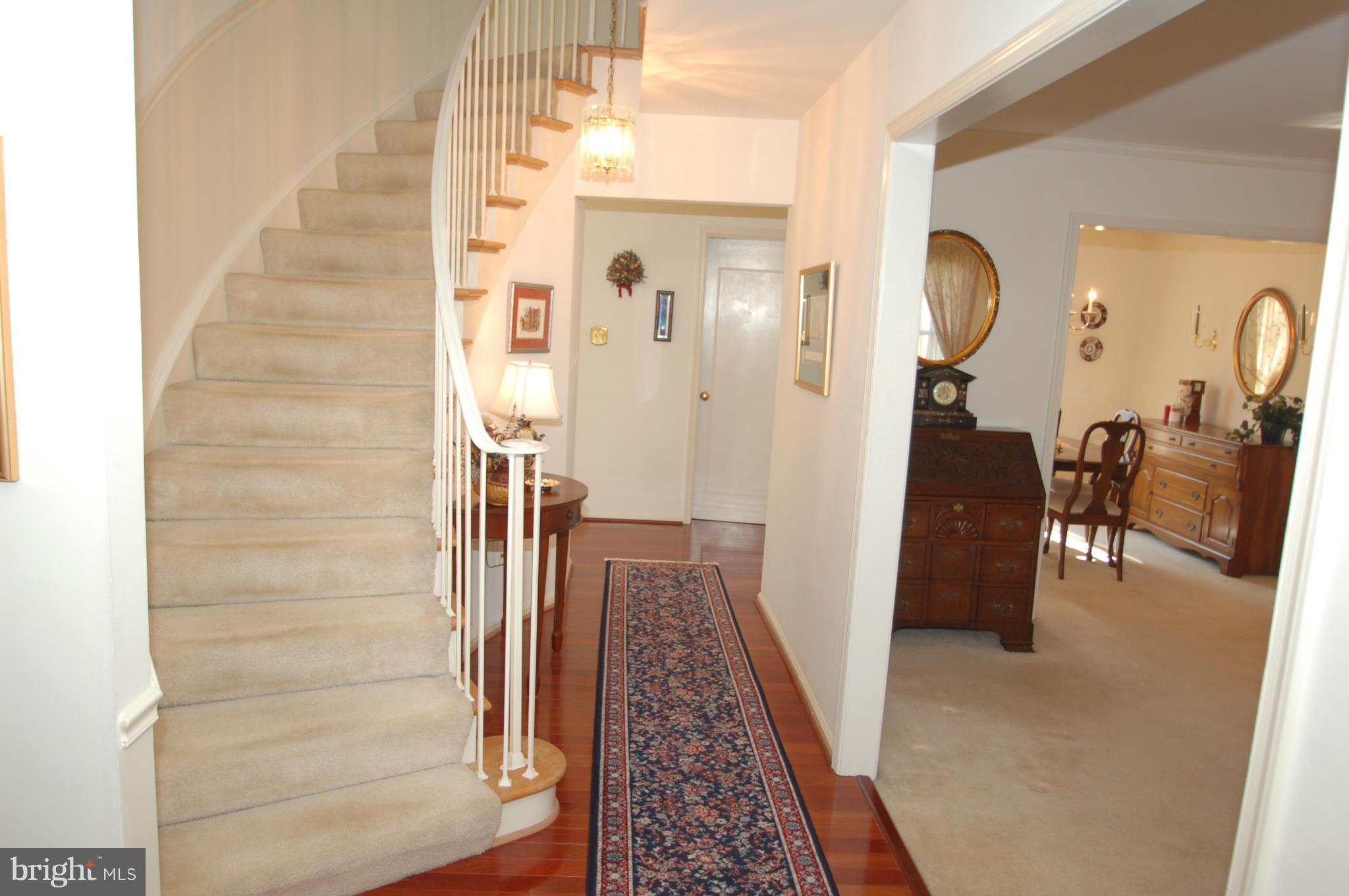 8515 Lakinhurst Lane Springfield, VA 22152 - Photo 2 of 30 Curved Stairway Entry w/ Brazilian Hardwood Floors