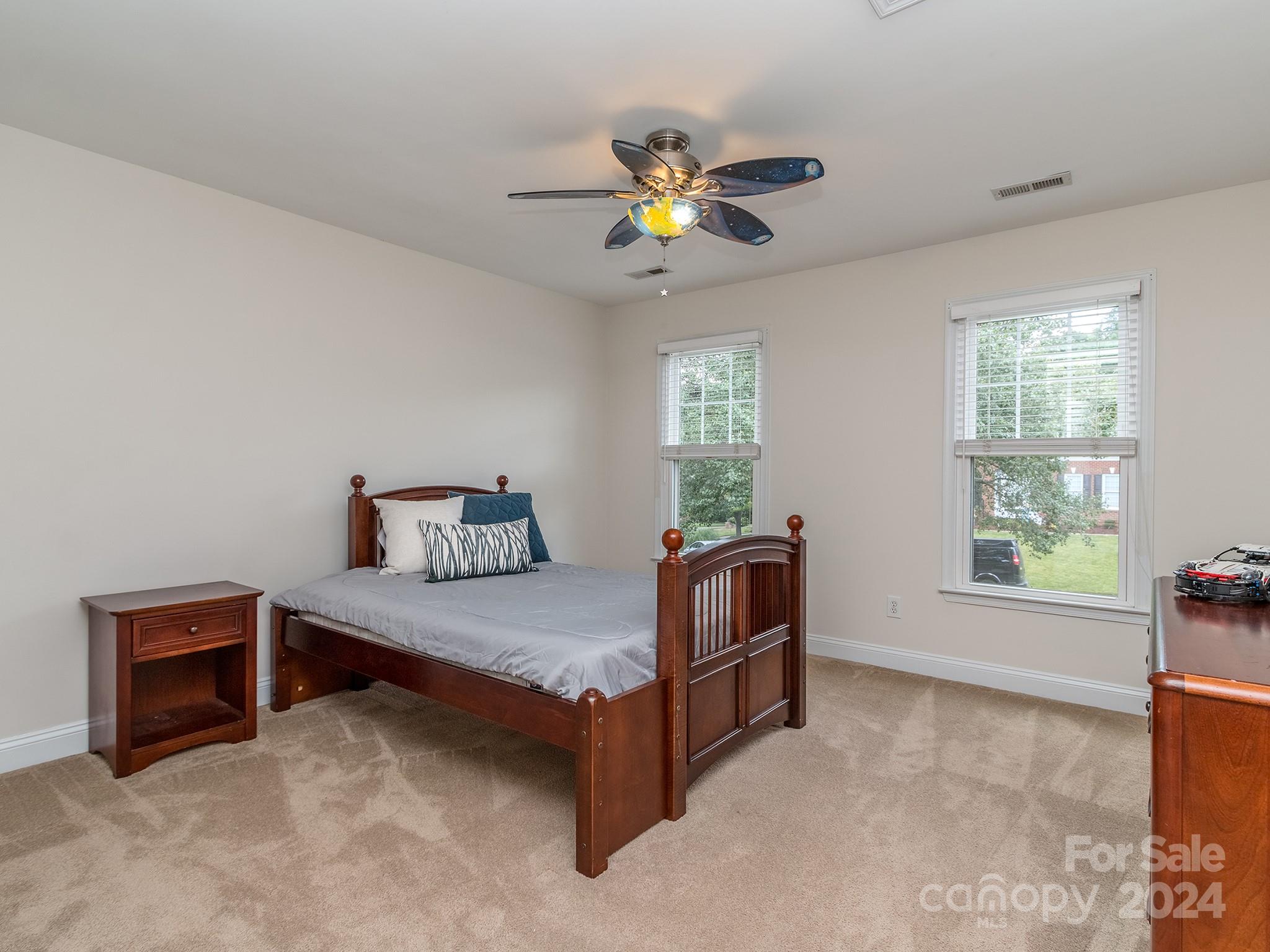 2028 Maynard Road Charlotte, NC 28270 - Photo 17 of 34 a bedroom with a bed and a window