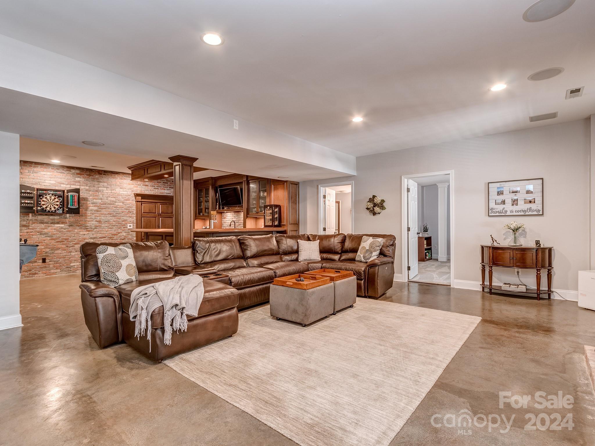 2028 Maynard Road Charlotte, NC 28270 - Photo 22 of 34 a living room with furniture and a couch
