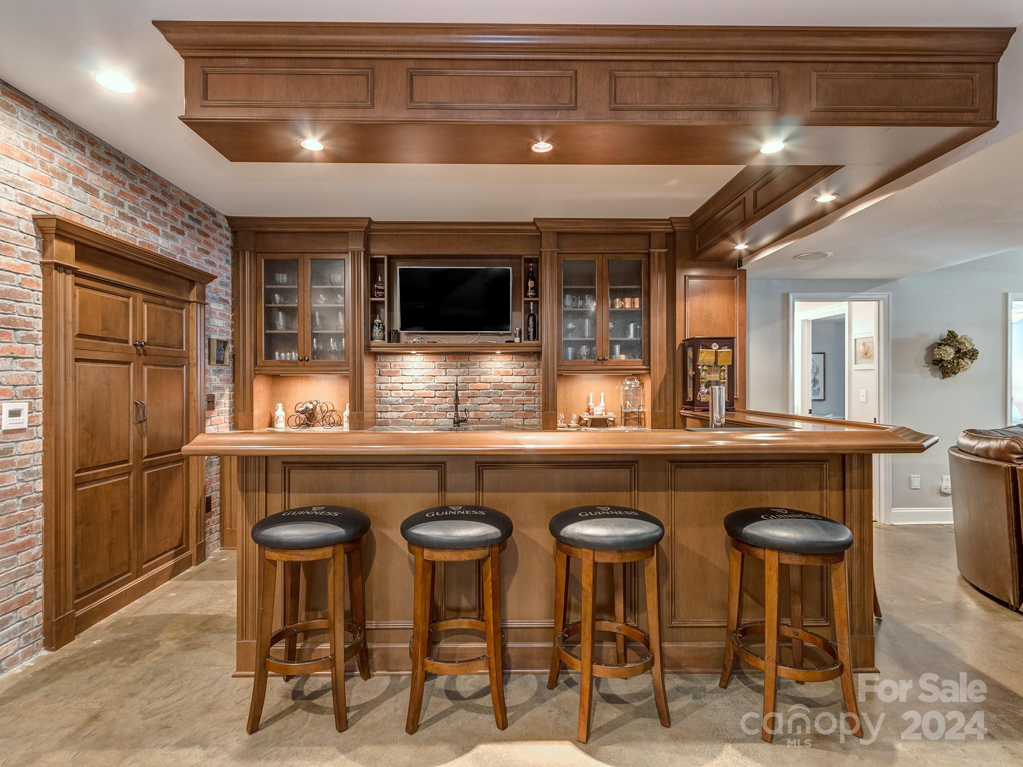 2028 Maynard Road Charlotte, NC 28270 - Photo 23 of 34 a kitchen with stainless steel appliances granite countertop a sink and a refrigerator