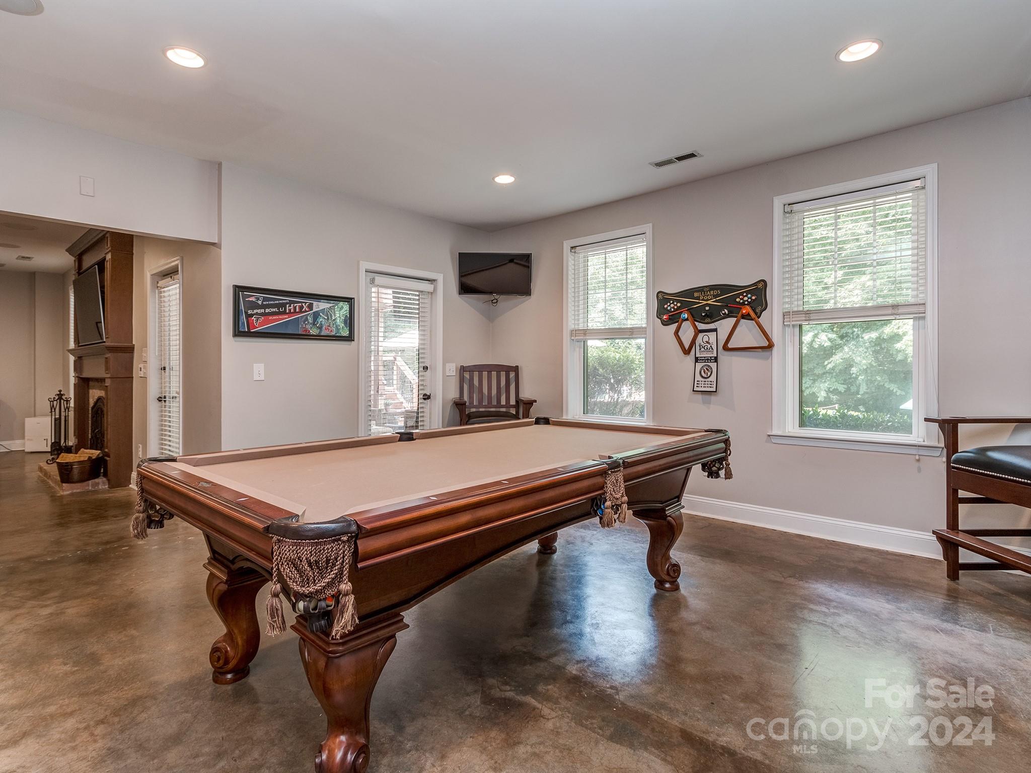 2028 Maynard Road Charlotte, NC 28270 - Photo 25 of 34 a room with furniture pool table and windows