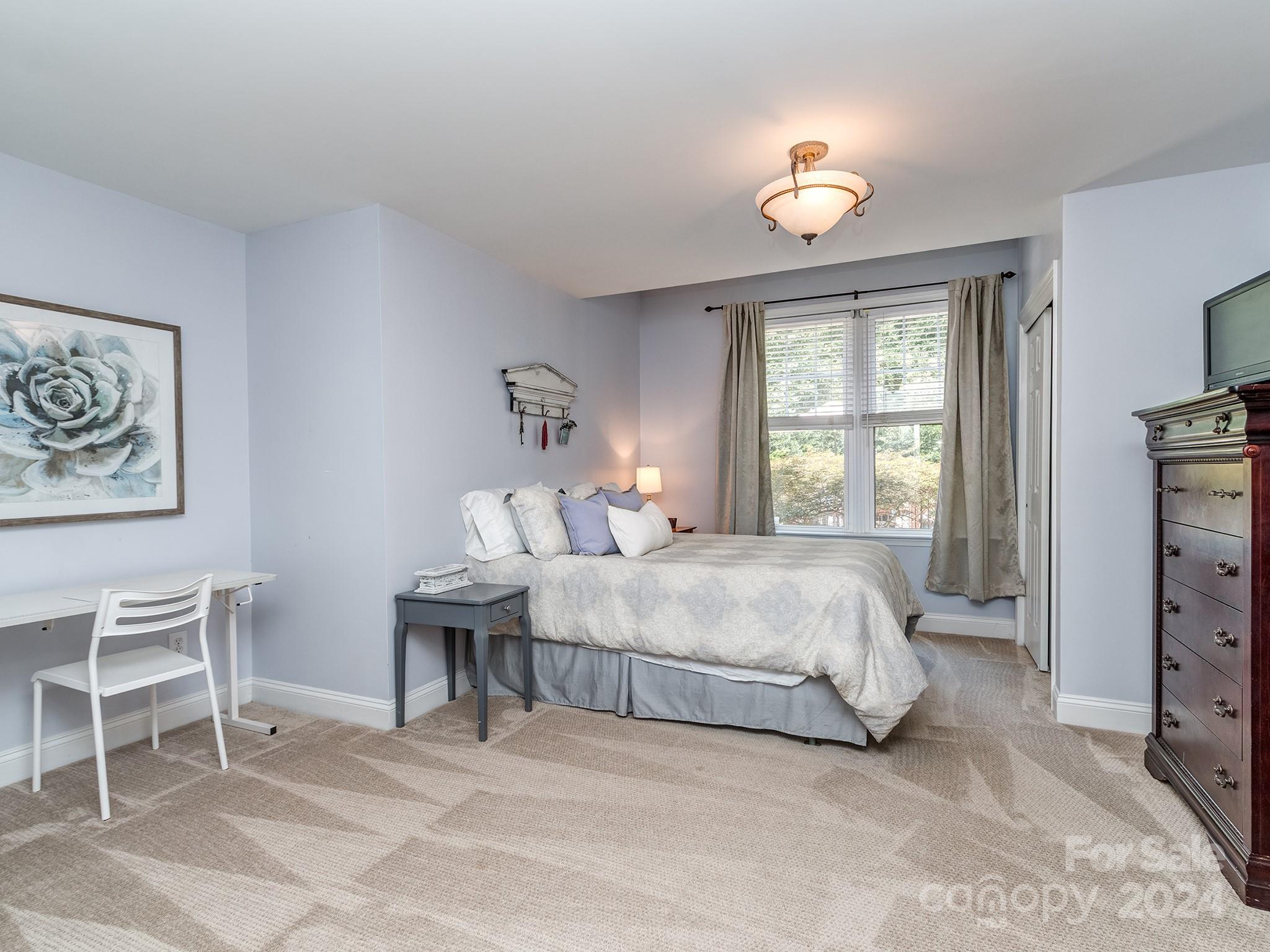 2028 Maynard Road Charlotte, NC 28270 - Photo 27 of 34 a bedroom with a bed and a window