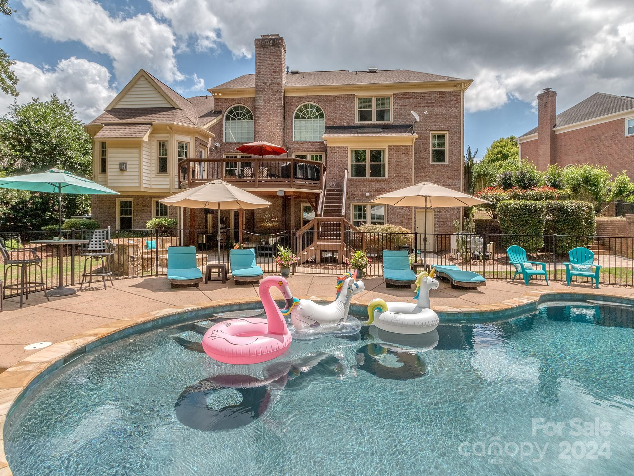 2028 Maynard Road Charlotte, NC 28270 - Photo 31 of 34 a view of a swimming pool with sitting area and furniture