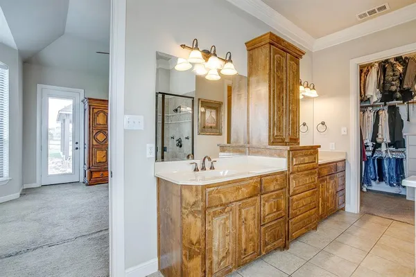 a bathroom with a sink a vanity and a mirror