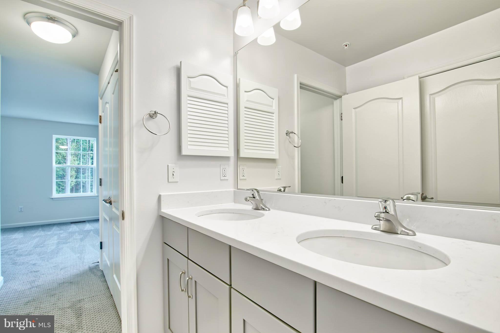 8103 Redstone Road Kingsville, MD 21087 - Photo 18 of 24 Hall bath with double sinks