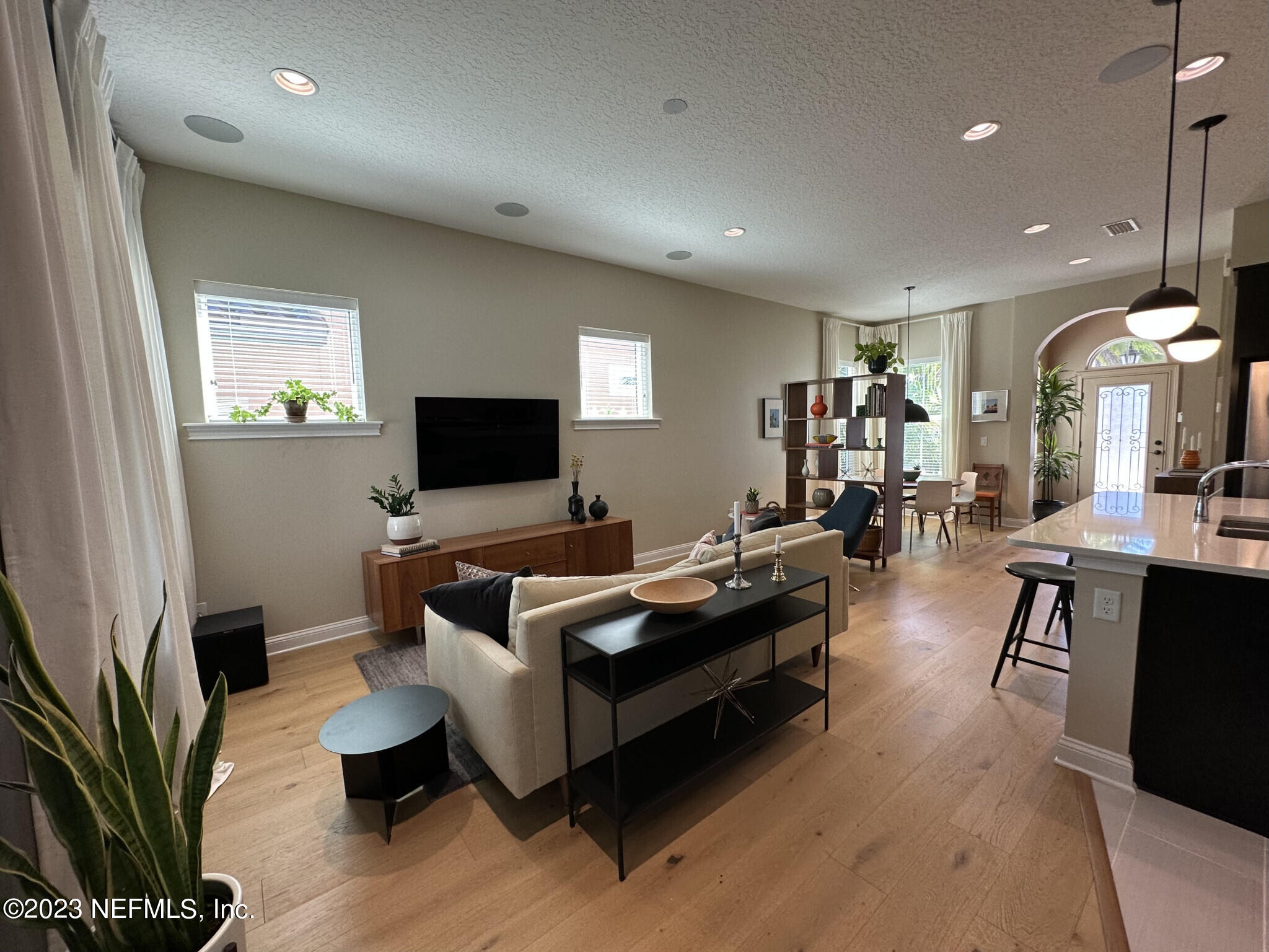 44 Rinaldo Way Ponte Vedra, FL 32081 - Photo 12 of 30 a living room with furniture and a flat screen tv