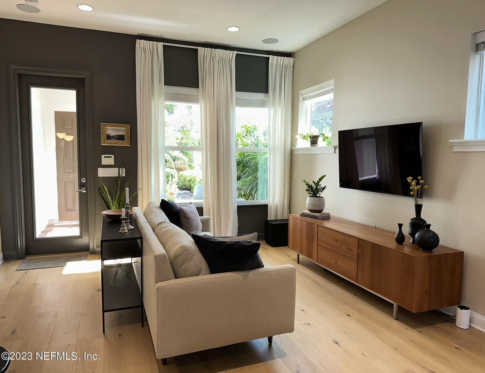 44 Rinaldo Way Ponte Vedra, FL 32081 - Photo 13 of 30 a living room with furniture and a flat screen tv