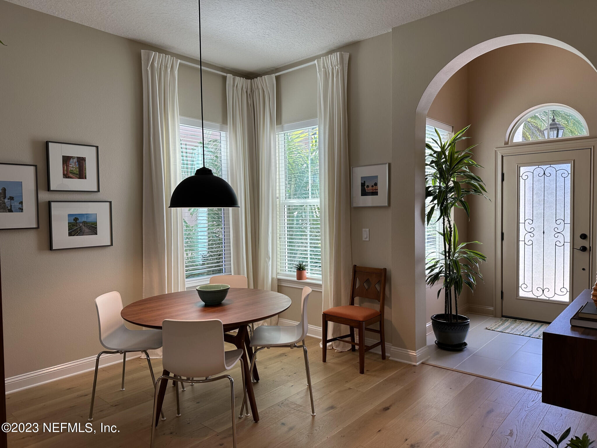 44 Rinaldo Way Ponte Vedra, FL 32081 - Photo 14 of 30 a living room with furniture and a potted plant