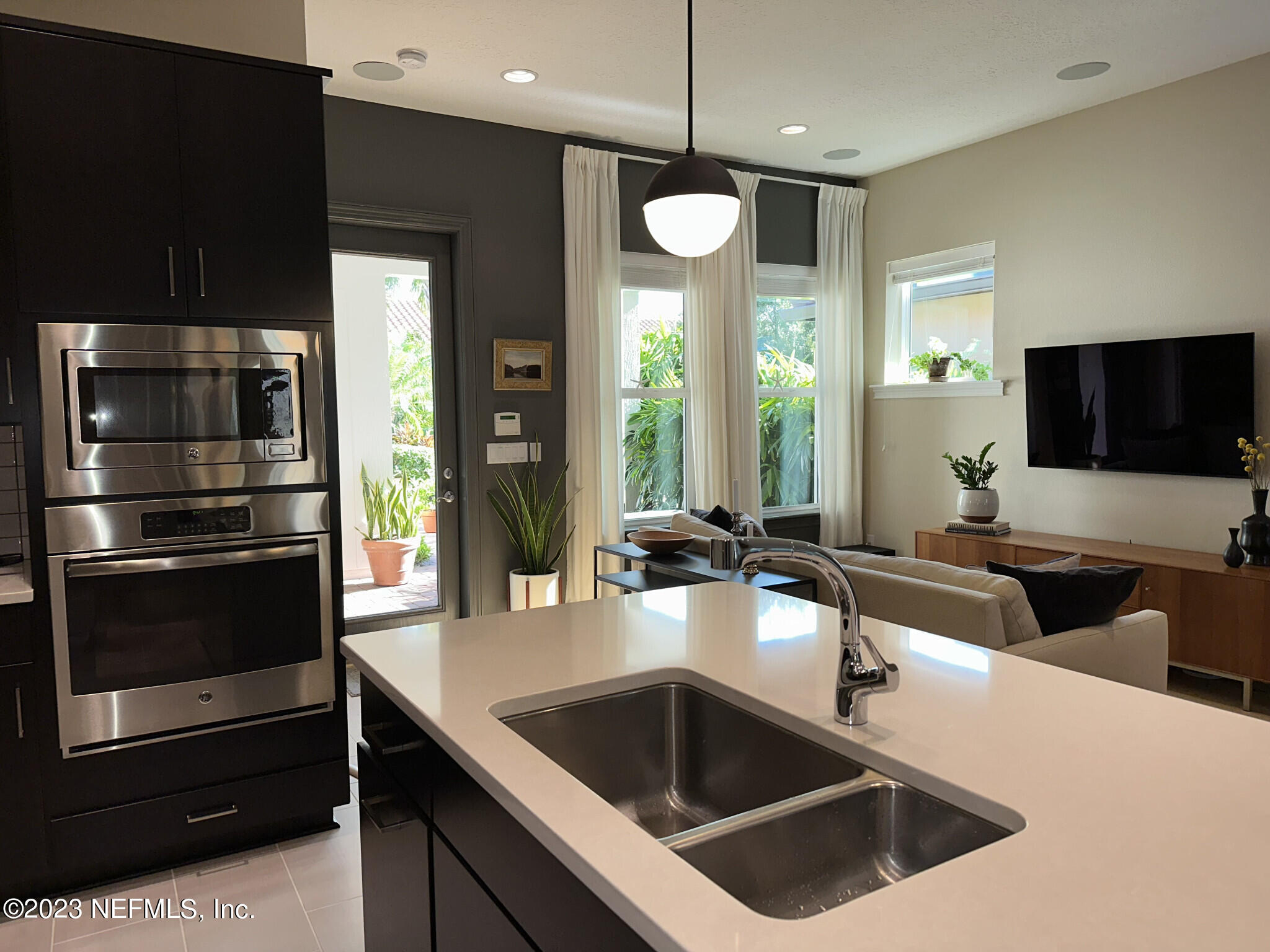 44 Rinaldo Way Ponte Vedra, FL 32081 - Photo 17 of 30 a kitchen with a sink cabinets and stainless steel appliances