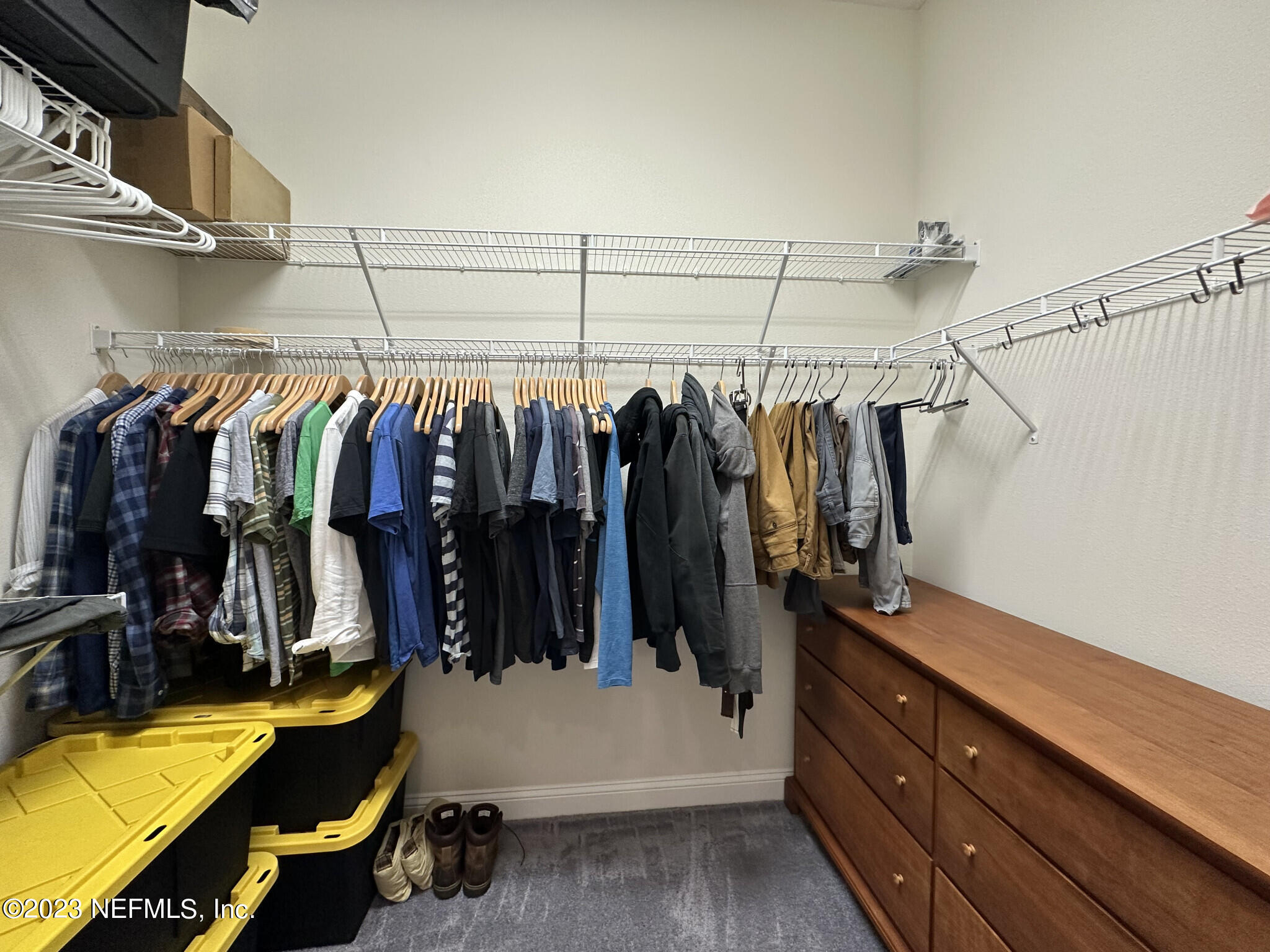 44 Rinaldo Way Ponte Vedra, FL 32081 - Photo 25 of 30 a view of walk in closet with clothes and shoes