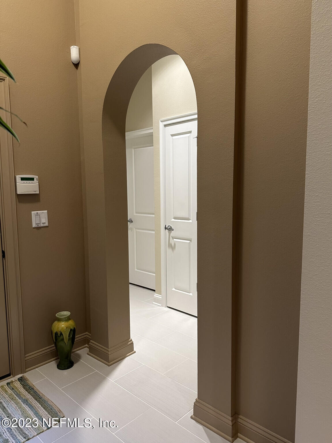 44 Rinaldo Way Ponte Vedra, FL 32081 - Photo 26 of 30 a view of a hallway with wooden cabinet