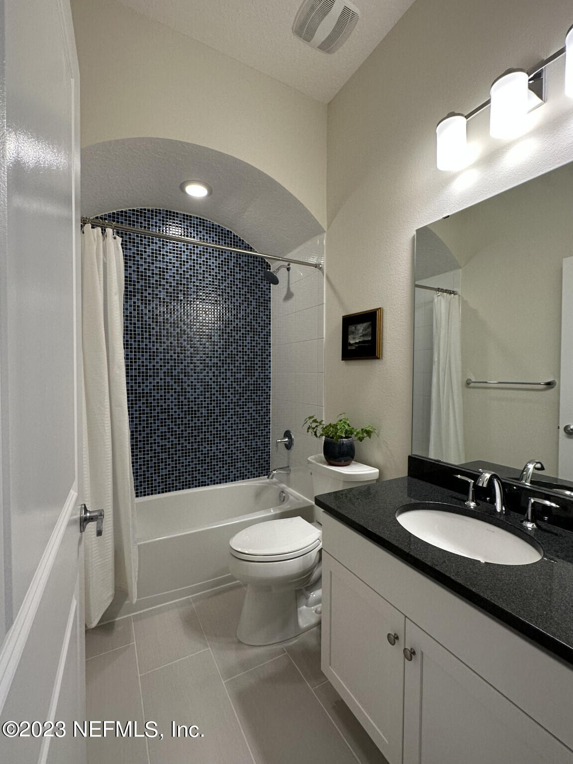 44 Rinaldo Way Ponte Vedra, FL 32081 - Photo 27 of 30 a bathroom with a sink a toilet and shower