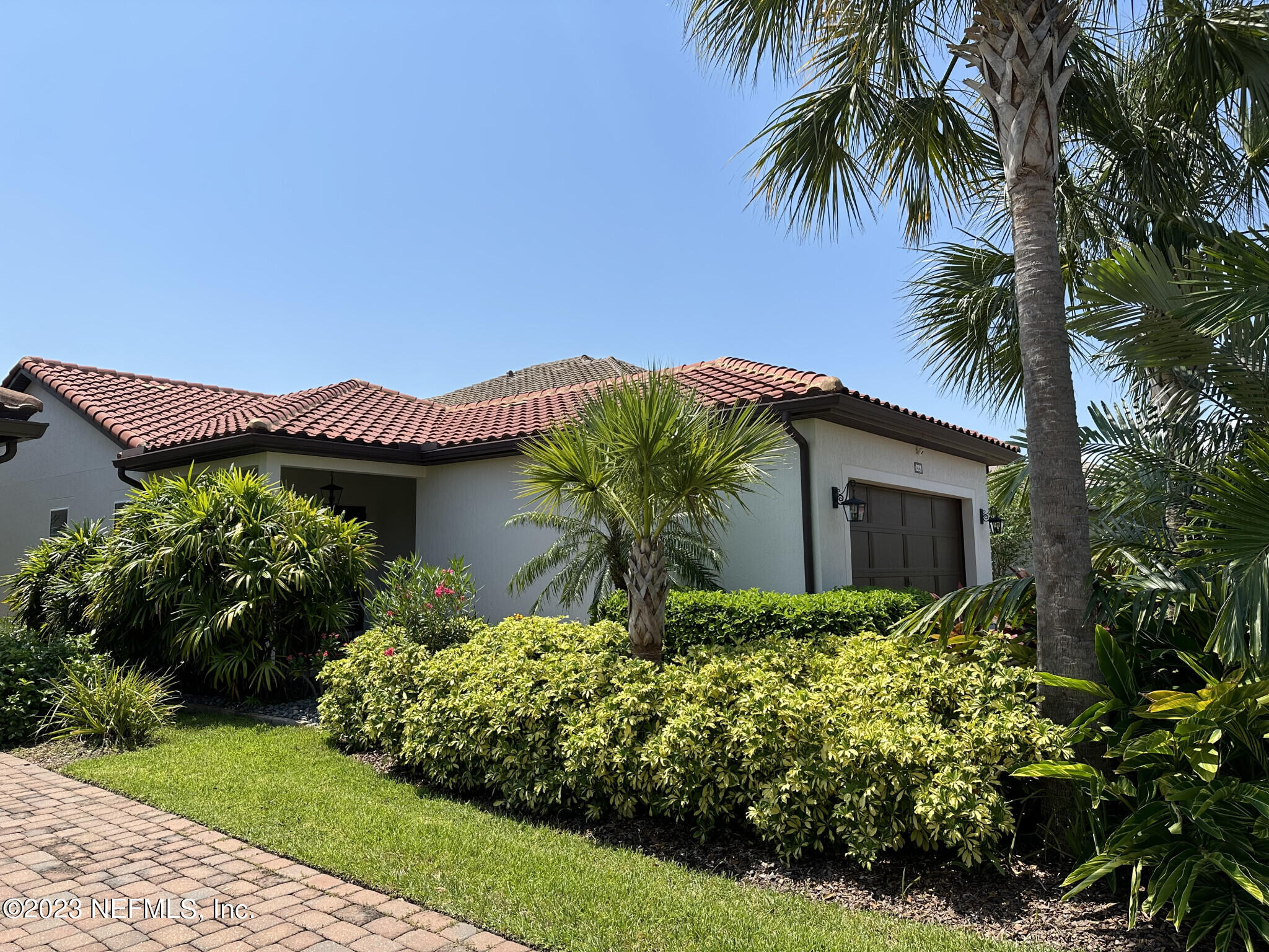 44 Rinaldo Way Ponte Vedra, FL 32081 - Photo 4 of 30 a front view of house with yard and green space