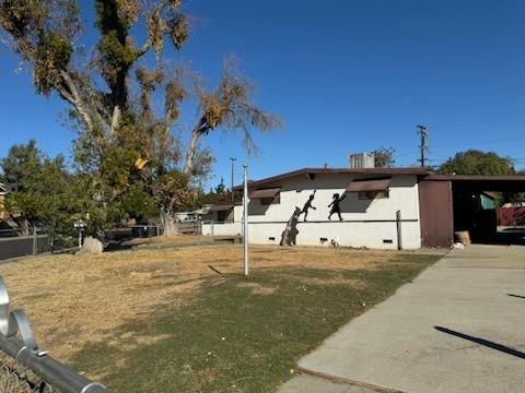 2724 Sparks Way Modesto, CA 95350 - Photo 4 of 11 a view of a house with a yard