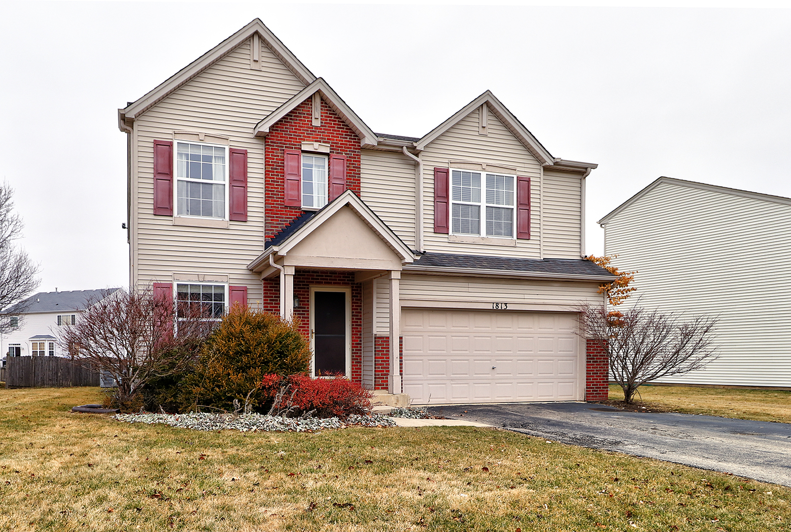 1813 Blue Ridge Drive Plainfield, IL 60586 - Photo 1 of 1 a front view of a house with a yard and garage