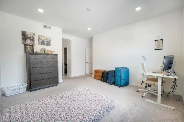 a room with furniture and wooden floor