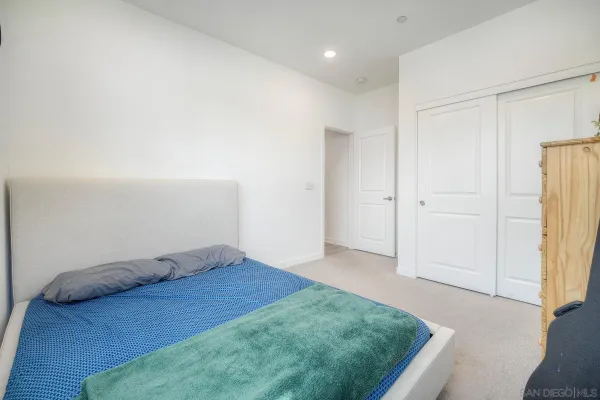a view of livingroom with hardwood floor and hallway