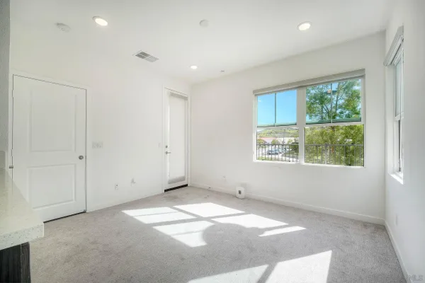 en empty room with a window