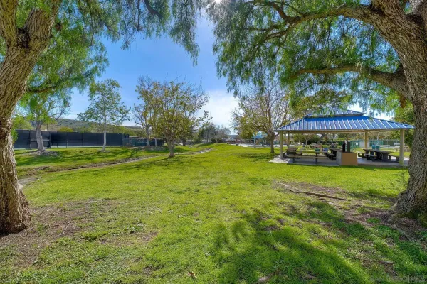 a view of a house with a big yard