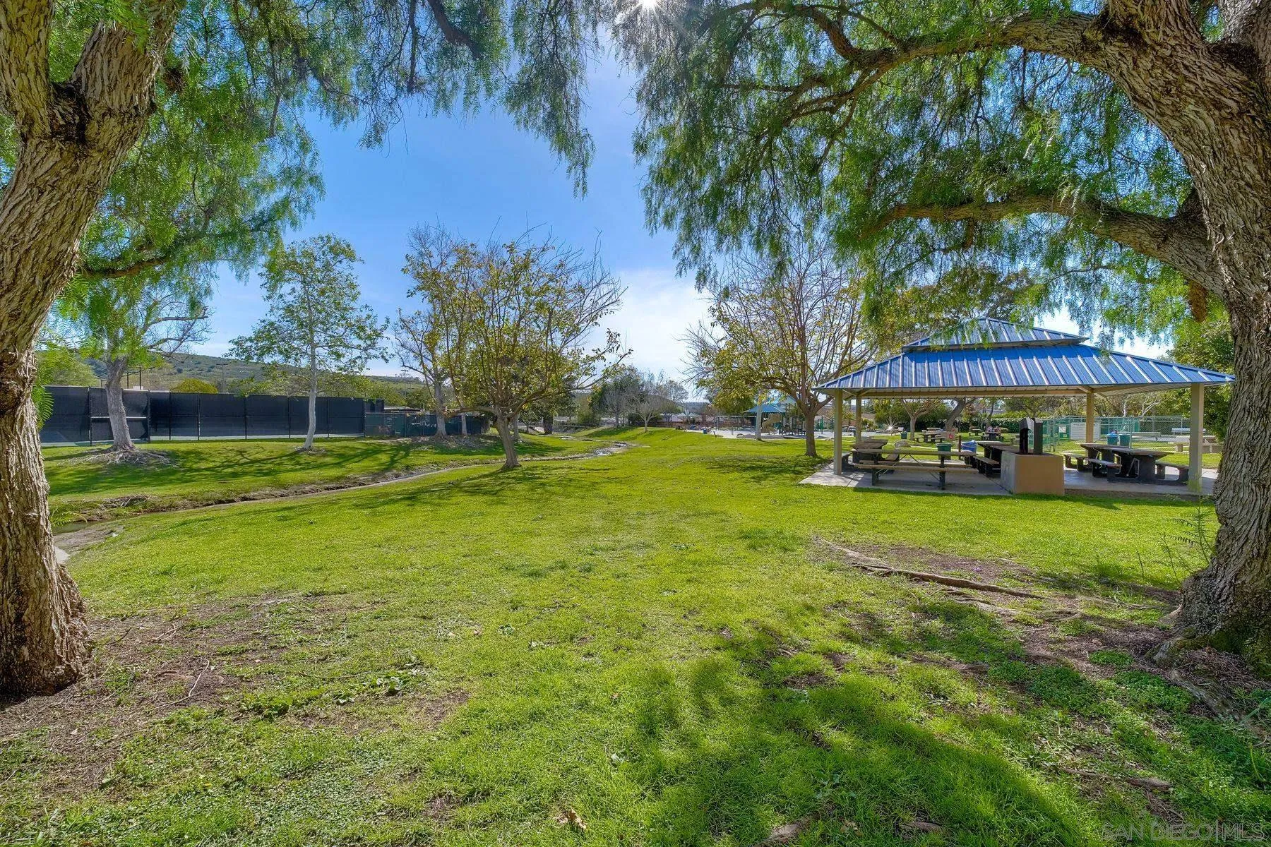 13087 Olympus Circle, Unit 2 Poway, CA 92064 - Photo 26 of 29 a view of a house with a big yard