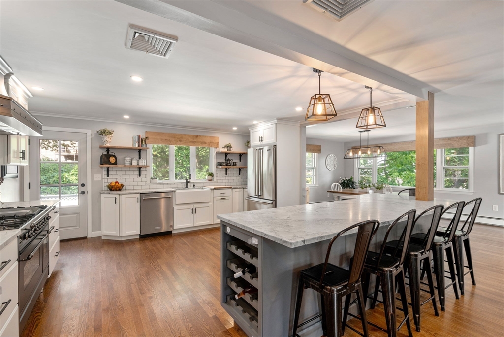 3 Community Road Marblehead, MA 01945 - Photo 1 of 37 a large kitchen with a table and chairs