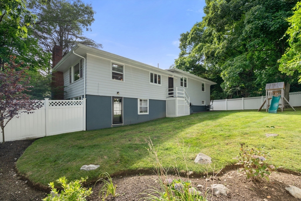 3 Community Road Marblehead, MA 01945 - Photo 29 of 37 a view of a house with a backyard