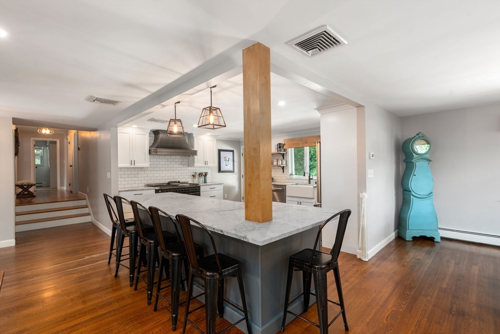 3 Community Road Marblehead, MA 01945 - Photo 6 of 37 a dining room with furniture and wooden floor