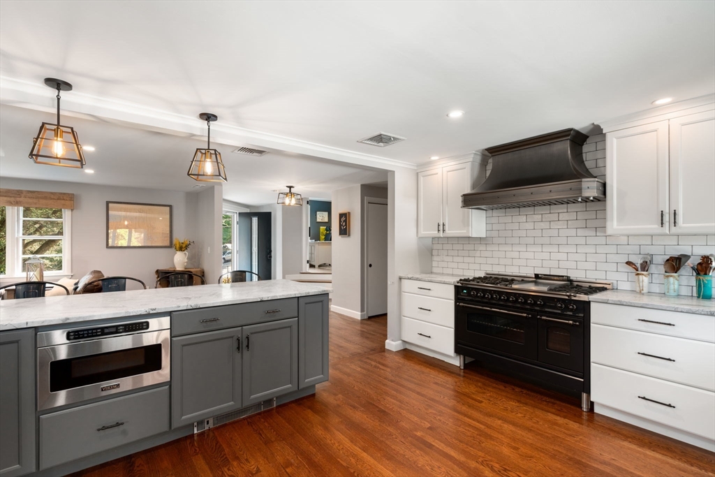 3 Community Road Marblehead, MA 01945 - Photo 7 of 37 a kitchen with a stove and a microwave
