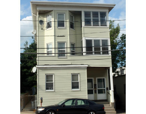 a view of a building with a window and balcony