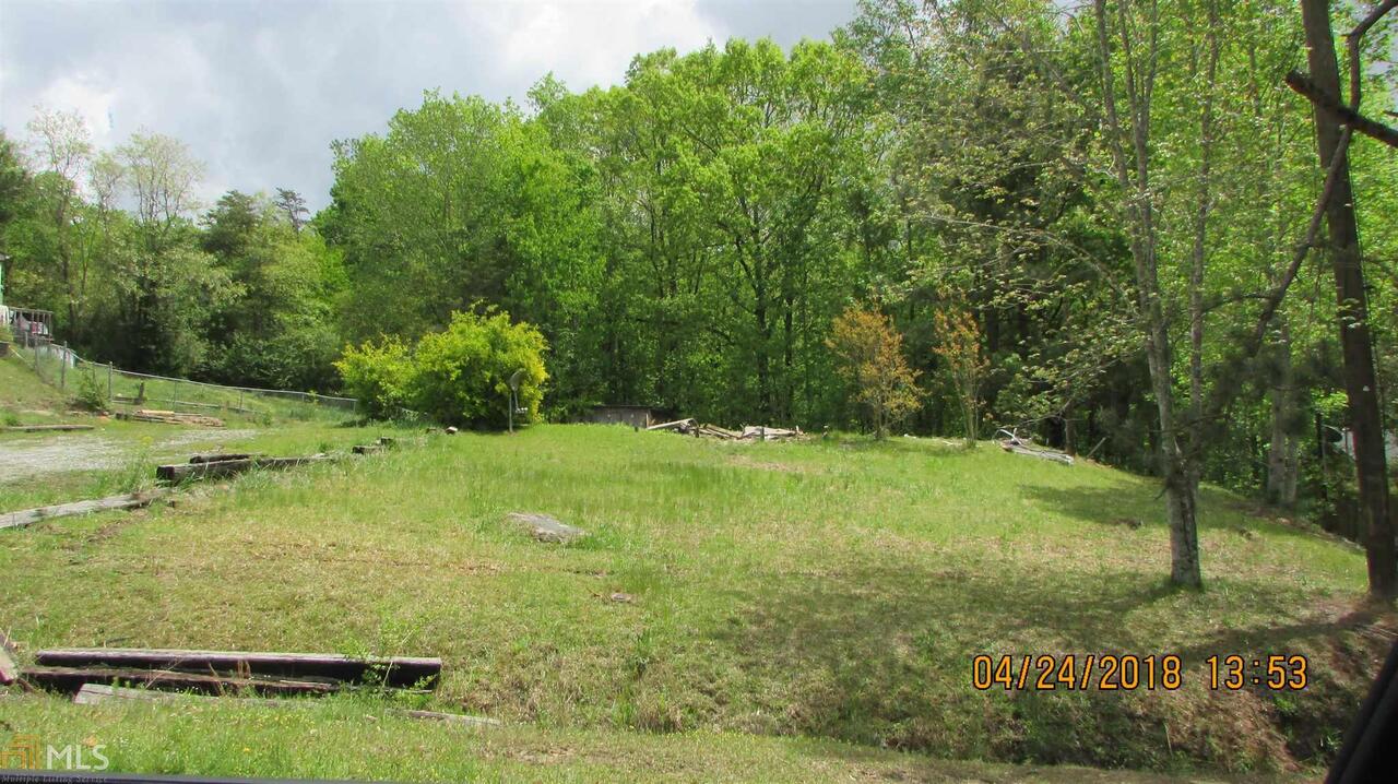 6255 Malibu Ridge Flowery Branch, GA 30542 - Photo 1 of 1 a view of a field with an trees