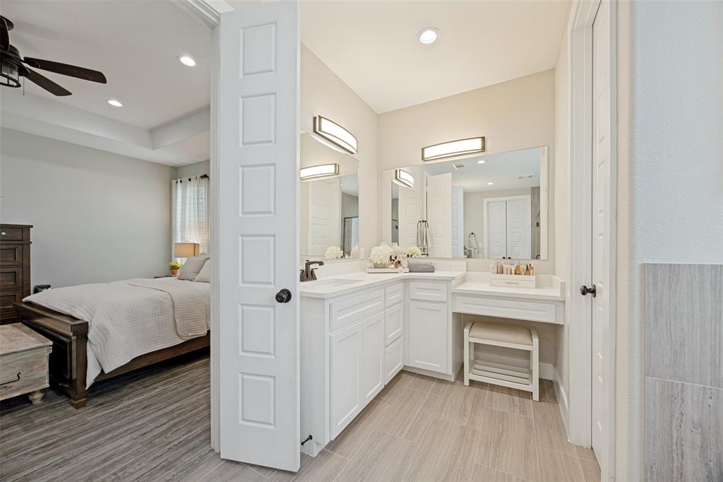 1105 Ranch Drive Bonham, TX 75418 - Photo 12 of 25 Primary bath has separate vanities and sink, also a makeup area and private toilet to the side.
