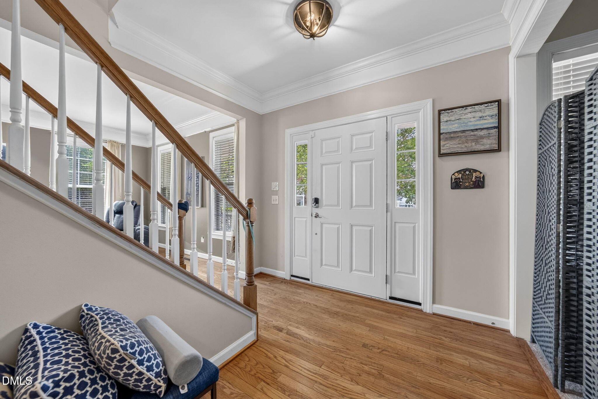 1258 Horsham Way Apex, NC 27502 - Photo 5 of 32 a view of an entryway with wooden floor
