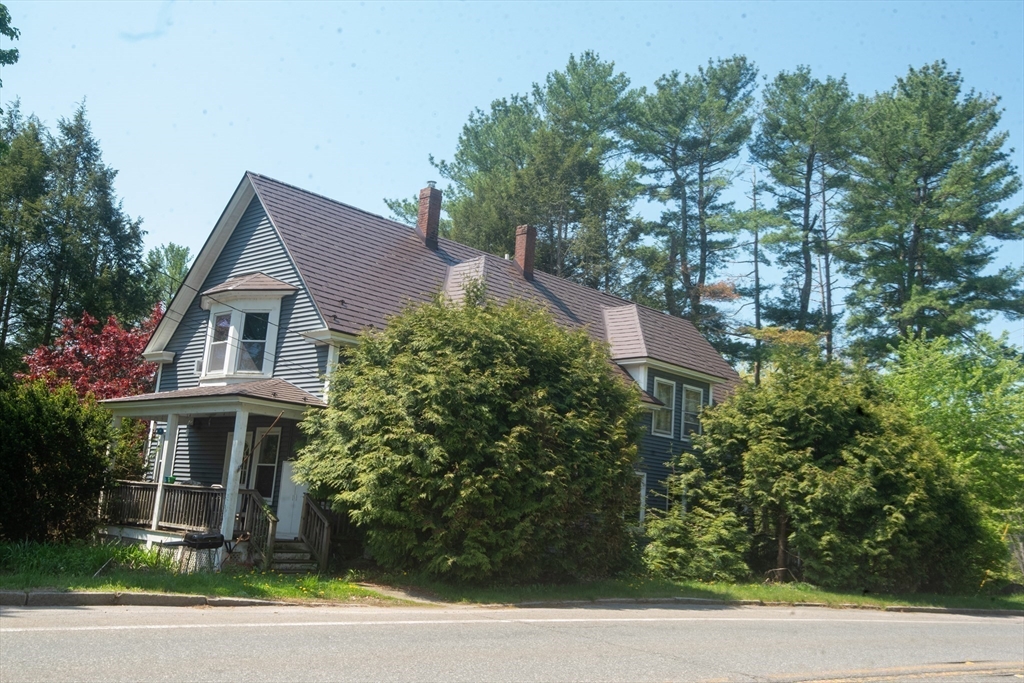 920 Worcester Road Barre, MA 01005 - Photo 29 of 40 a front view of a house with a garden