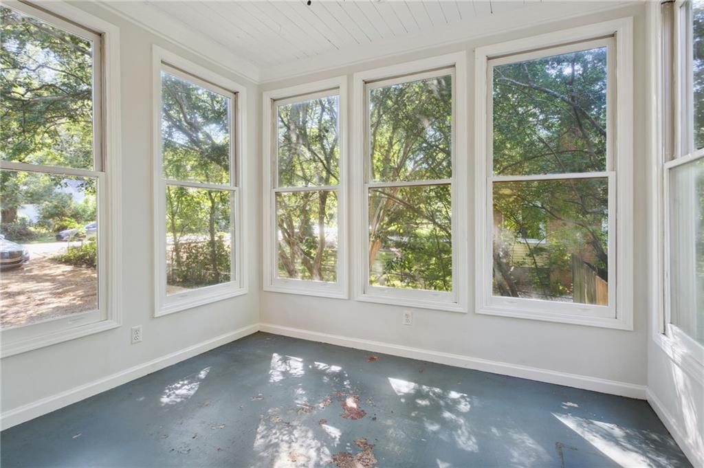 385 Sunset Drive Athens, GA 30606 - Photo 24 of 48 a view of an empty room with a window