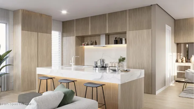 a kitchen with stainless steel appliances kitchen island granite countertop a sink and cabinets