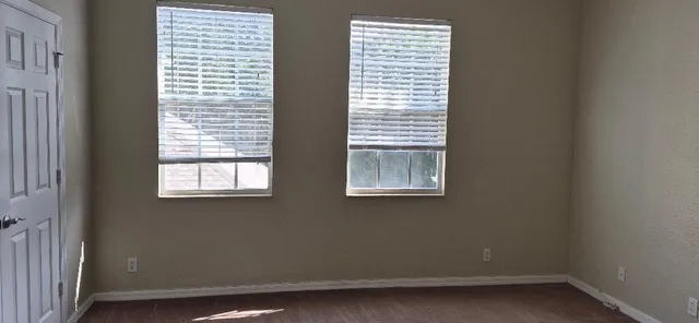 a view of a room that has a window in it