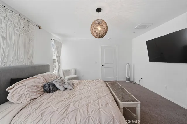 a bathroom with a bathtub shower sink and toilet